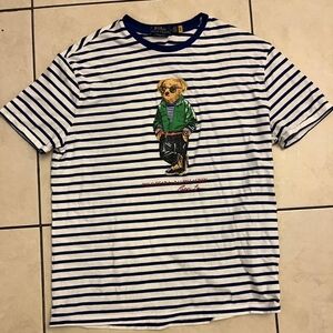 Polo Ralph Lauren mans t - shirt features classic blue and white stripes.